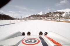 porsche-pulling-skiers-on-frozen-lake