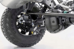 Closeup of the 2021 Bronco solid rear axle linkage and the M220 Dana 44 differential with electronic locking.