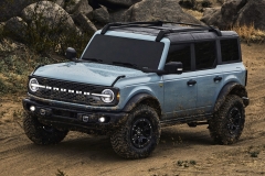 Pre-production 2021 Bronco four-door Badlands series with available Sasquatch™ off-road package in Cactus Gray with the doors, top and rear quarter windows removed.
